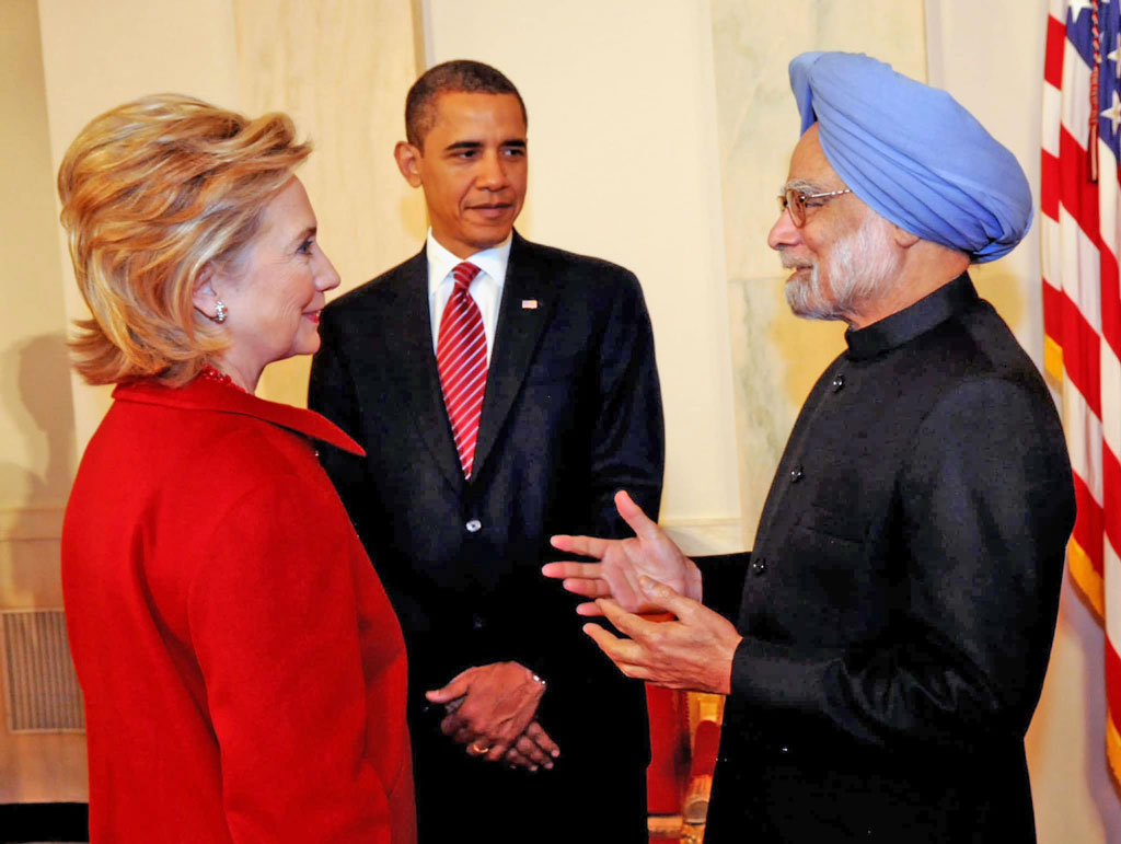 Former Prime Minister, Dr. Manmohan Singh with the former US President, Mr. Barack Obama, at White House, Washington on November 24, 2009. The US Secretary of State, Ms. Hillary Clinton is also seen.